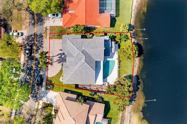 birds eye view of property featuring a water view