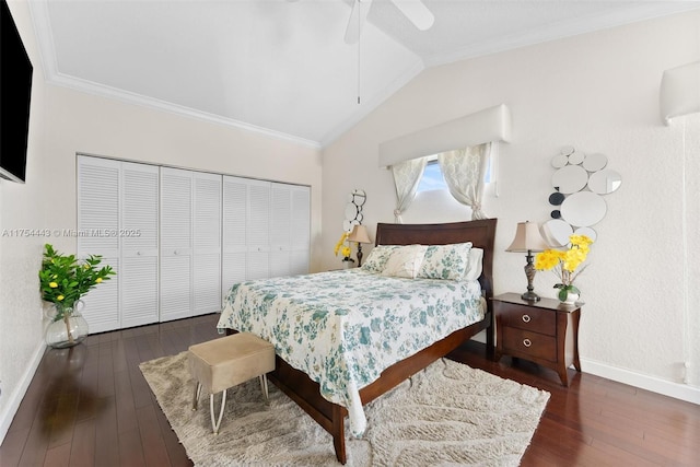 bedroom with baseboards, hardwood / wood-style floors, crown molding, and vaulted ceiling