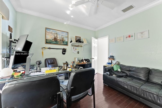 office space featuring a ceiling fan, wood finished floors, visible vents, and ornamental molding