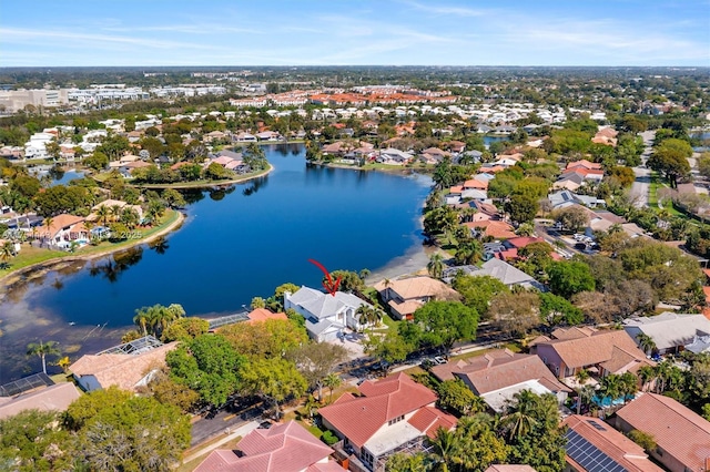 aerial view with a residential view and a water view