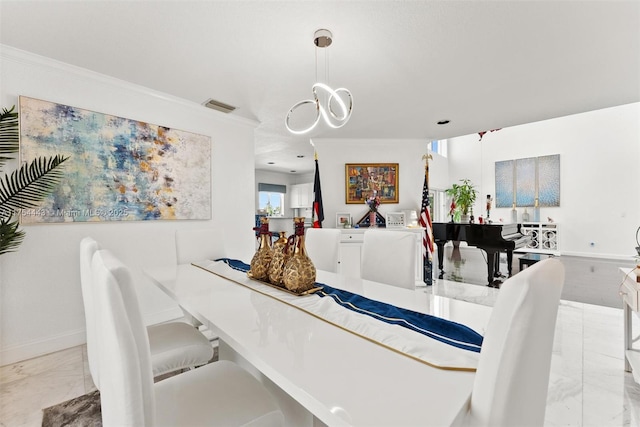 dining area featuring visible vents, baseboards, marble finish floor, and an inviting chandelier