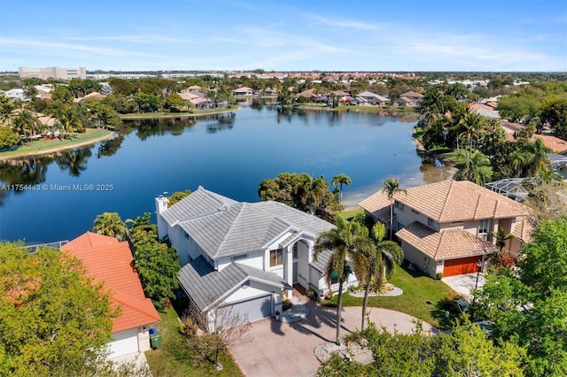 aerial view with a water view and a residential view