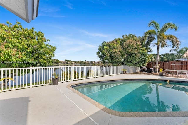 view of swimming pool featuring a patio area, a fenced in pool, and a fenced backyard