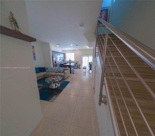 interior space featuring tile patterned floors and stairway