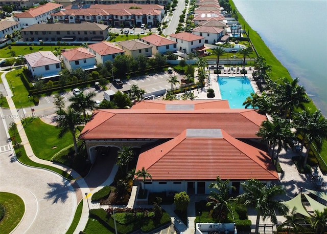 aerial view featuring a water view and a residential view