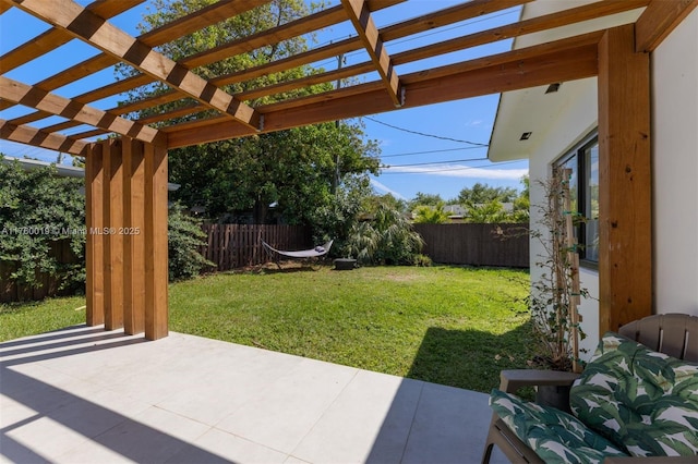 exterior space featuring a patio area, a fenced backyard, and a pergola