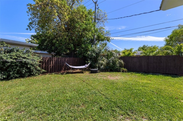 view of yard with fence