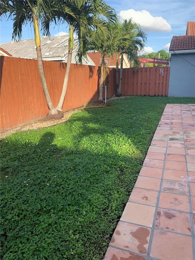 view of yard featuring a fenced backyard