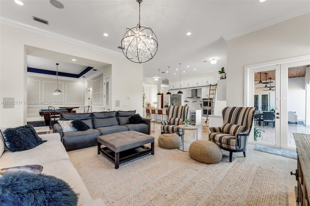 8111 SW 178th St, Palmetto Bay, FL 33157 - living room with french doors, visible vents, ornamental molding, recessed lighting, and an inviting chandelier