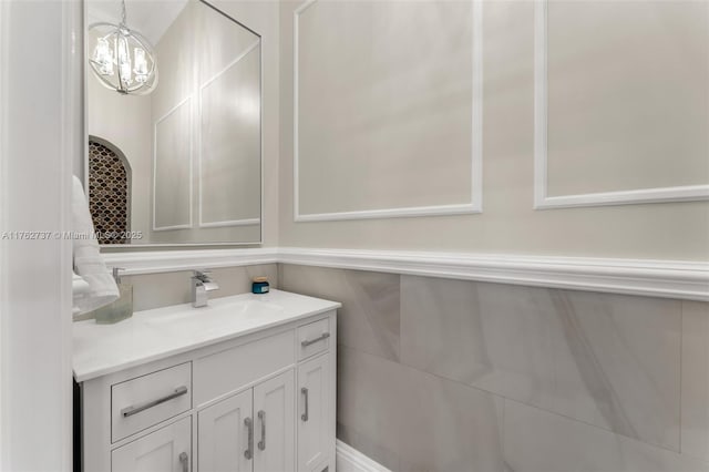 8111 SW 178th St, Palmetto Bay, FL 33157 - bathroom featuring vanity and a chandelier