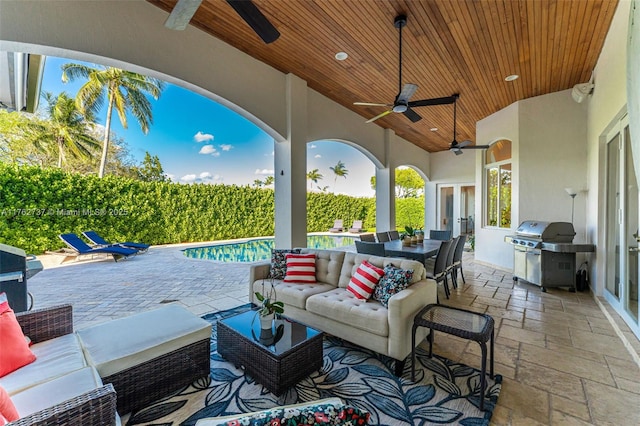 8111 SW 178th St, Palmetto Bay, FL 33157 - view of patio featuring an outdoor hangout area, outdoor dining space, grilling area, french doors, and an outdoor kitchen