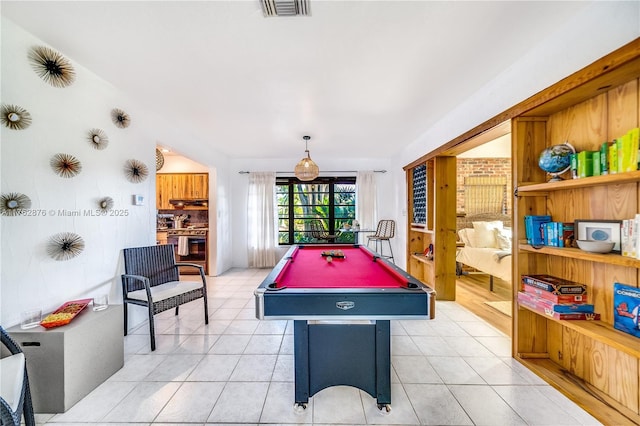 game room with light tile patterned floors, visible vents, and billiards