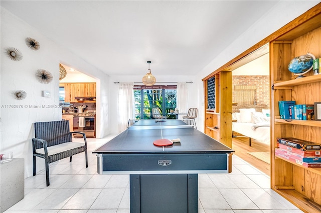 game room with light tile patterned floors