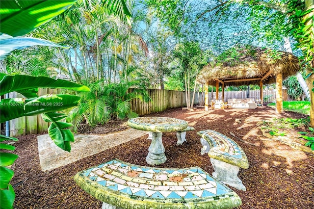 view of yard with a gazebo, a patio, and a fenced backyard