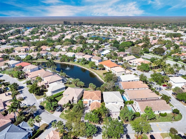 aerial view featuring a residential view and a water view