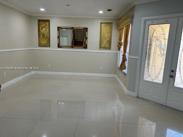 entryway featuring crown molding, recessed lighting, visible vents, and baseboards