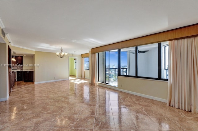 300 Three Islands Blvd Unit 518, Hallandale Beach, FL 33009 - spare room featuring a chandelier and baseboards