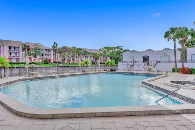 300 Three Islands Blvd Unit 518, Hallandale Beach, FL 33009 - community pool with a residential view and a patio area