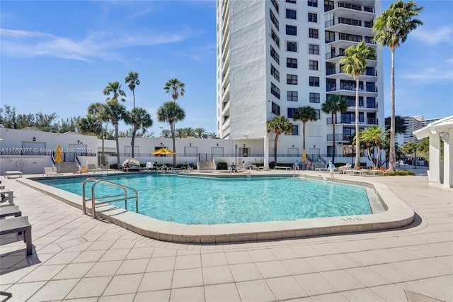 pool with a patio area