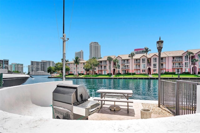 view of pool featuring a water view