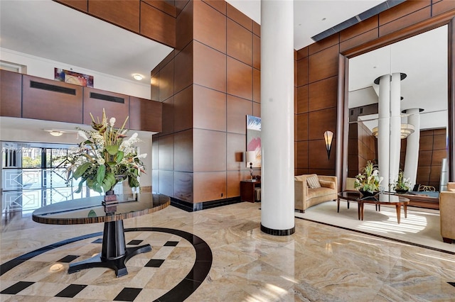 300 Three Islands Blvd Unit 518, Hallandale Beach, FL 33009 - building lobby with a towering ceiling