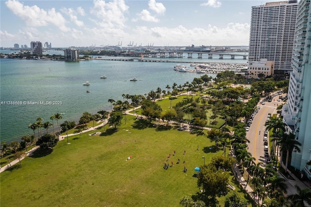 aerial view featuring a city view and a water view