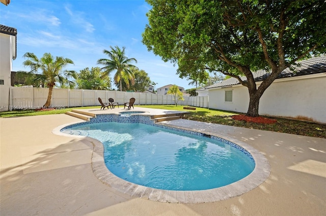 view of pool with a patio area, a fenced in pool, and a fenced backyard