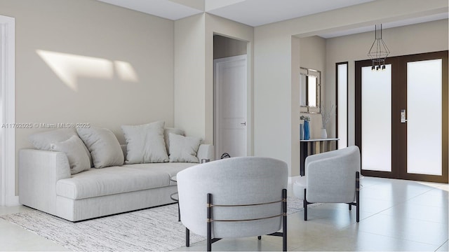 living area featuring tile patterned floors and french doors