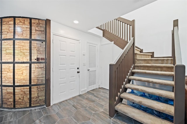 11696 NW 20th Dr Unit 11696, Coral Springs, FL 33071 - corridor with an upstairs landing, a towering ceiling, baseboards, and recessed lighting