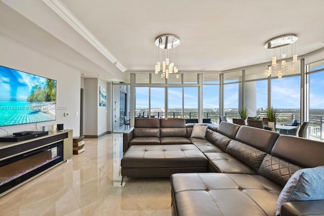 living area featuring a chandelier, floor to ceiling windows, crown molding, and baseboards