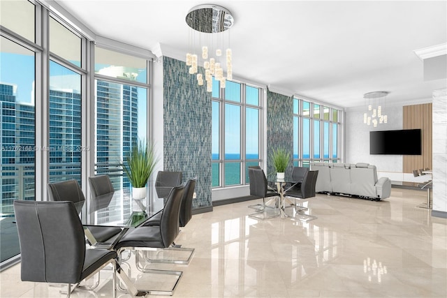 3535 S Ocean Dr Unit 2606, Hollywood, FL 33019 - dining room featuring a chandelier, ornamental molding, healthy amount of natural light, and floor to ceiling windows