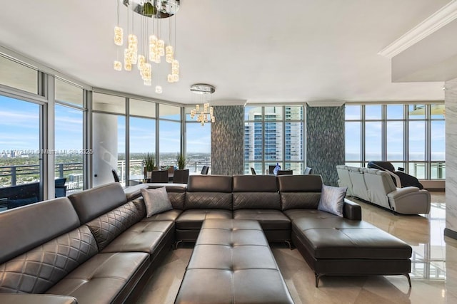 living room with floor to ceiling windows and a notable chandelier