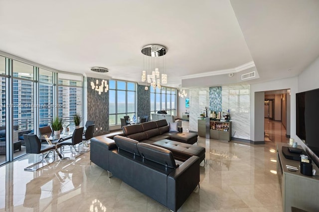 living room featuring a chandelier, visible vents, marble finish floor, and a wall of windows