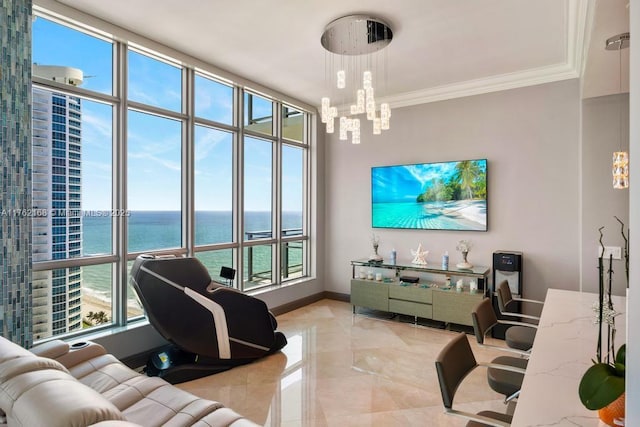 living room with a chandelier, marble finish floor, crown molding, and baseboards