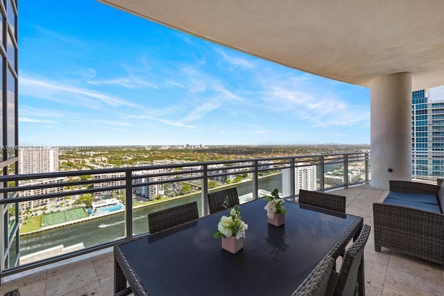 balcony featuring a view of city