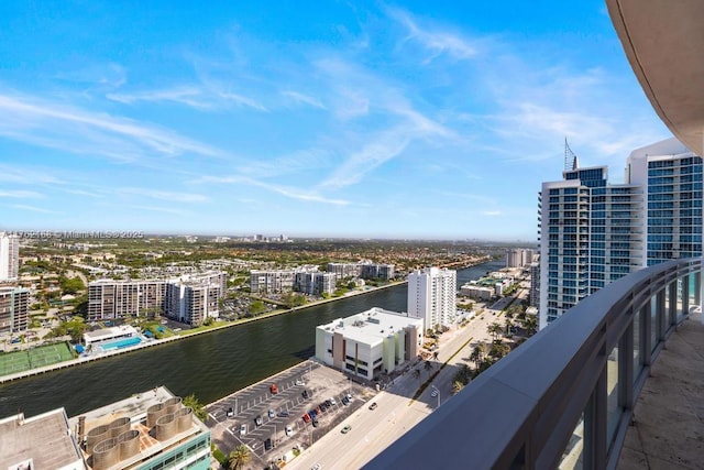 balcony with a city view and a water view