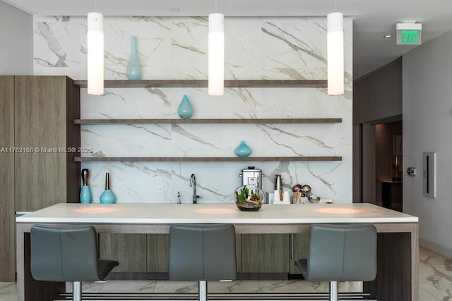 bar with marble finish floor and stone wall