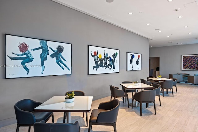 dining area with recessed lighting and light wood-type flooring