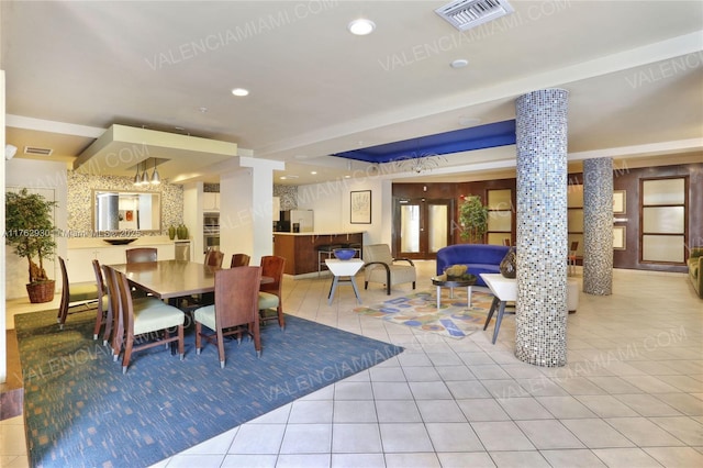 dining space with recessed lighting, visible vents, french doors, and tile patterned flooring