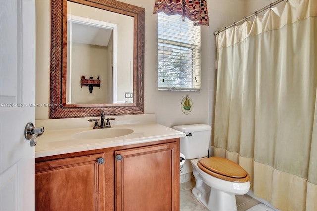 bathroom with vanity, toilet, and a shower with curtain