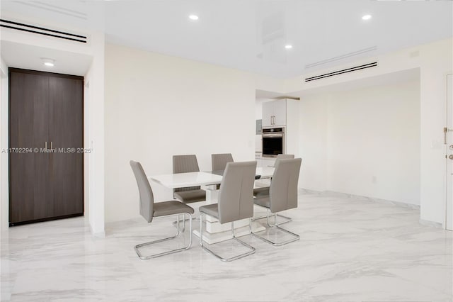 dining room featuring recessed lighting, visible vents, and marble finish floor