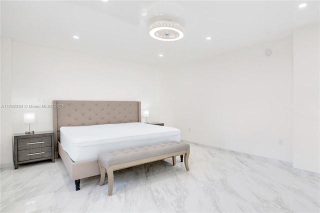 bedroom featuring recessed lighting and marble finish floor