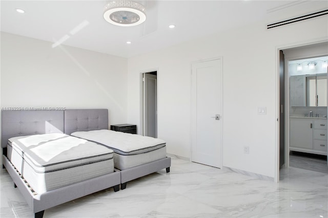 bedroom with recessed lighting and marble finish floor