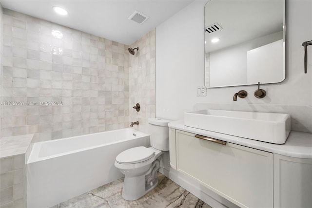 full bathroom featuring visible vents, vanity, toilet, and  shower combination