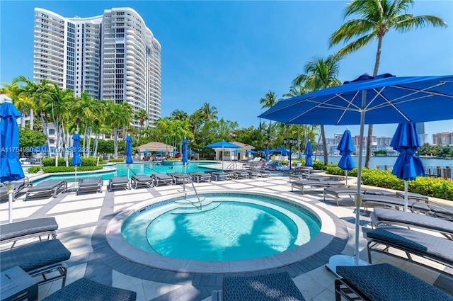 community pool with a patio