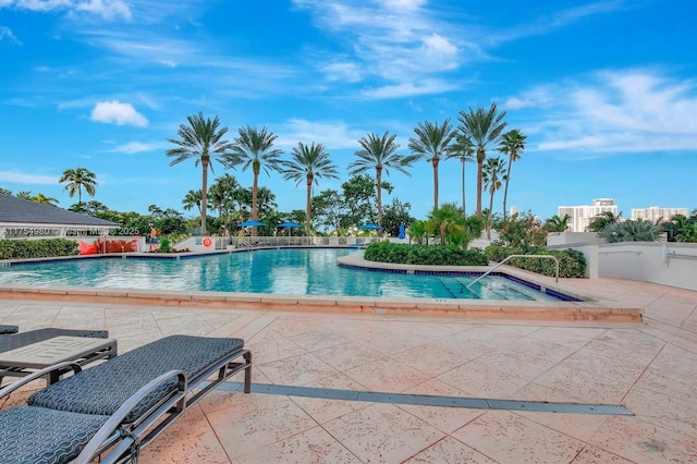 pool with a patio