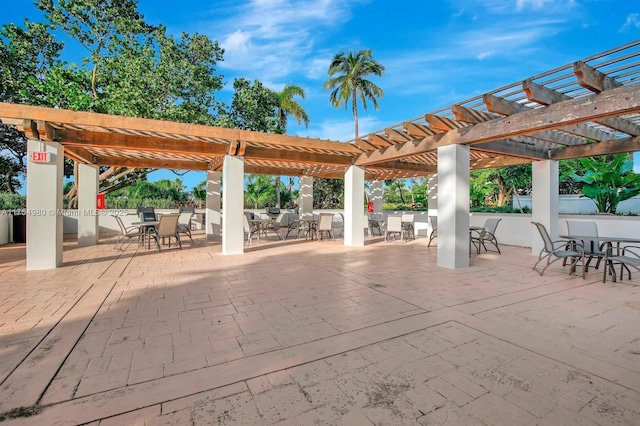 view of patio / terrace featuring outdoor dining space and a pergola