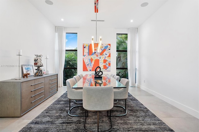 dining room with recessed lighting, baseboards, and a healthy amount of sunlight