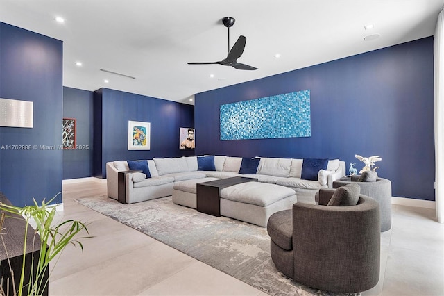 living room featuring recessed lighting, baseboards, and a ceiling fan