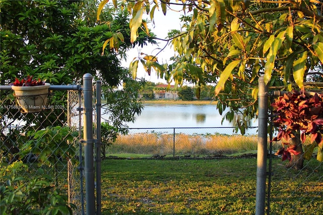 view of water feature with fence